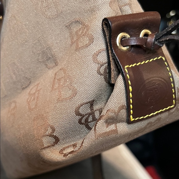 Dooney & Bourke Signature Tassel Tote Bag - Picture 8 of 15
